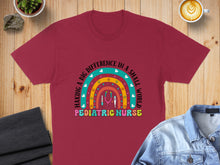 Load image into Gallery viewer, Maroon t-shirt with rainbow graphic and "Pediatric Nurse" text.