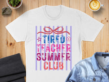 Load image into Gallery viewer, T-shirt with "Tired Teacher Summer Club" text and a striped background.
