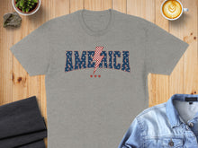 Load image into Gallery viewer, Grey t-shirt with "AMERICA" text and red lightning bolt and stars.