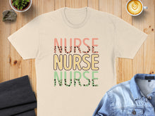 Load image into Gallery viewer, Beige t-shirt with "NURSE" text in three colorful, layered fonts.