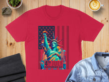 Load image into Gallery viewer, Red t-shirt with Statue of Liberty and American flag graphic for July 4th.