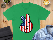 Load image into Gallery viewer, Green t-shirt with a peace sign in American flag colors.