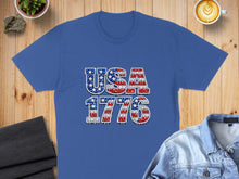Load image into Gallery viewer, Blue t-shirt with "USA 1776" text in American flag pattern.