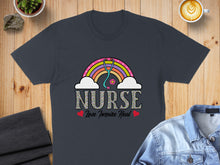 Load image into Gallery viewer, Dark t-shirt with "NURSE Love Inspire Heal" text and a rainbow stethoscope graphic.