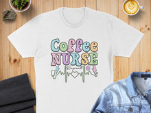 Load image into Gallery viewer, White t-shirt with colorful "Coffee Nurse Repeat" text and EKG line.