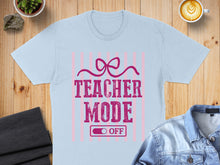 Load image into Gallery viewer, Light blue t-shirt with "TEACHER MODE ON OFF" design.