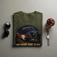 Load image into Gallery viewer, Green t-shirt with graphic of globe, radio, and text "THE BANDS COME ALIVE".