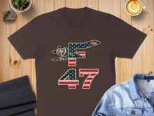 Load image into Gallery viewer, Brown t-shirt with American flag airplane and "47" graphic.