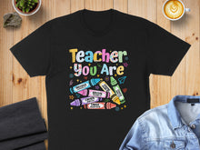 Load image into Gallery viewer, T-shirt with "Teacher You Are Precious, Special, Chosen, Strong, Unique, Lovely" text and crayon graphics.