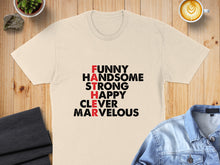 Load image into Gallery viewer, Cream t-shirt with red and black text reading "FUNNY HANDSOME STRONG HAPPY CLEVER MARVELOUS FATHER".