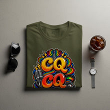 Load image into Gallery viewer, Green t-shirt with "CQ CQ" graphic, microphone, radio dial, and rainbow accents.