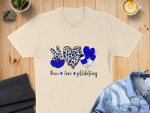 Load image into Gallery viewer, Cream t-shirt with "Peace love phlebotomy" text and medical icons.