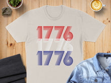 Load image into Gallery viewer, Cream t-shirt with repeating red, white, and blue "1776" text design.