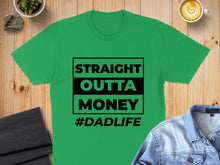 Load image into Gallery viewer, Green t-shirt with black text reading "STRAIGHT OUTTA MONEY #DADLIFE".