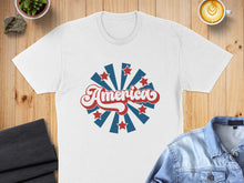 Load image into Gallery viewer, White t-shirt with "America" in red and blue lettering, surrounded by starburst.