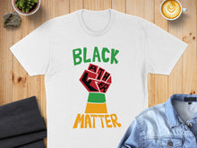Load image into Gallery viewer, White t-shirt with Black Lives Matter fist graphic and orange, green, yellow stripes.