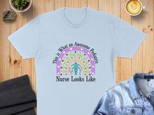 Load image into Gallery viewer, Light blue t-shirt with colorful "Awesome Pediatric Nurse" text and rainbow stethoscope.