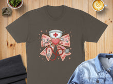 Load image into Gallery viewer, Nurse graphic with stethoscope, heart, and XOXO pattern on a brown t-shirt.