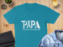 Load image into Gallery viewer, Teal t-shirt with "PAPA IF HE CAN'T FIX IT, NO ONE CAN" graphic.