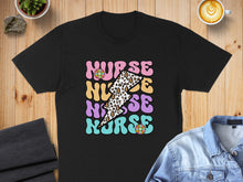 Load image into Gallery viewer, Black t-shirt with "NURSE" text in groovy pastel fonts and leopard print lightning bolt.