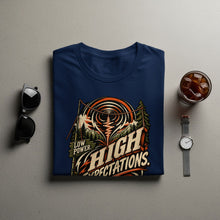 Load image into Gallery viewer, Navy t-shirt with "Low Power. High Expectations." graphic featuring mountains and radio waves.
