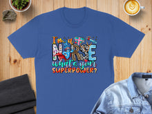 Load image into Gallery viewer, Blue t-shirt with "Nurse What's Your Superpower?" text and cartoon nurse design.
