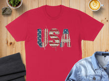 Load image into Gallery viewer, Red t-shirt with distressed USA flag lettering, styled with denim jacket and coffee.