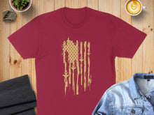 Load image into Gallery viewer, Maroon t-shirt with distressed flag design featuring stars and swords.