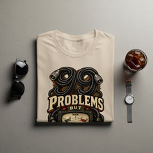 Load image into Gallery viewer, Cream t-shirt with "99 PROBLEMS" graphic featuring coiled cables and an SWR meter.