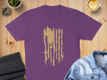 Load image into Gallery viewer, Purple t-shirt with distressed American flag design in gold.