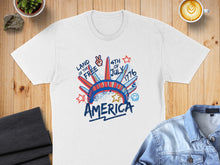 Load image into Gallery viewer, White t-shirt with "Land of the Free 4th of July 1776" graphic.