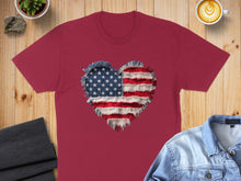 Load image into Gallery viewer, Burgundy t-shirt featuring a distressed American flag heart graphic.