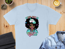 Load image into Gallery viewer, Light blue t-shirt with "Keep Calm I'm a Nurse" graphic of a woman with butterflies.