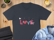 Load image into Gallery viewer, Dark gray t-shirt with pink stethoscope, heart, syringe, and pills forming the word "LOVE".