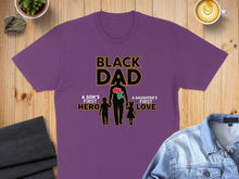 Load image into Gallery viewer, Purple t-shirt with "Black Dad, A Son's First Hero, A Daughter's First Love" text.