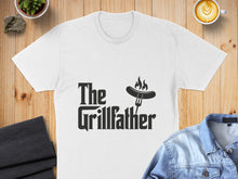Load image into Gallery viewer, White t-shirt with "The Grillfather" text and flame-topped sausage on a fork.