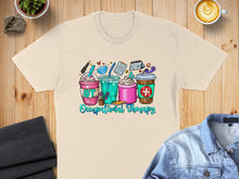 Load image into Gallery viewer, T-shirt graphic with coffee cups, planner, and "Occupational Therapy" text.