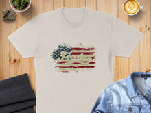 Load image into Gallery viewer, Distressed US flag with "Freedom" text on a cream t-shirt.