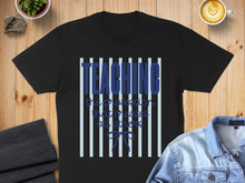 Load image into Gallery viewer, Black t-shirt with "TEACHING the profession that creates all others" text.