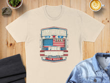 Load image into Gallery viewer, America, Land of the Free Because of the Brave, 1776 graphic on a t-shirt.