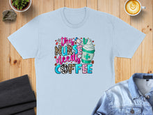 Load image into Gallery viewer, Light blue t-shirt with "This Nurse Needs Coffee" graphic and latte.