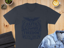Load image into Gallery viewer, Dark t-shirt with "Faith & Family Freedom 1776-2026" text and eagle design.