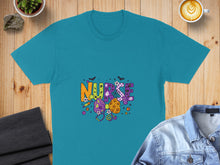 Load image into Gallery viewer, Teal t-shirt with colorful "NURSE" Halloween graphic featuring bats, candy, and polka dots.