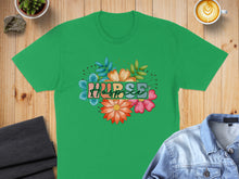 Load image into Gallery viewer, Green t-shirt with colorful floral "Nurse" text design.