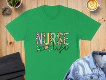 Load image into Gallery viewer, Green t-shirt with "Nurse Life" text and colorful syringe graphic.