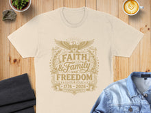Load image into Gallery viewer, Cream t-shirt with "Faith & Family AND Freedom" in ornate gold lettering.
