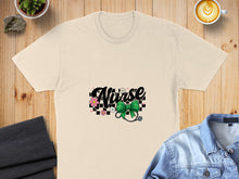 Load image into Gallery viewer, Cream t-shirt with "Nurse" text, stethoscope, and floral accents.