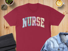 Load image into Gallery viewer, Burgundy t-shirt with "NURSE" text in colorful, patterned patchwork letters.