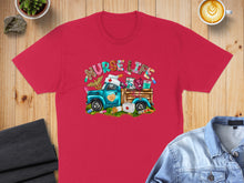 Load image into Gallery viewer, Red t-shirt featuring cartoon truck with "NURSE LIFE" text and medical supplies.