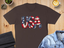Load image into Gallery viewer, Brown t-shirt featuring "USA" text with American flag pattern.